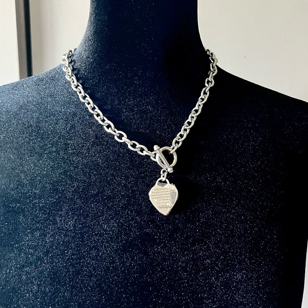 Sterling silver heart necklace with Scripture written on heart.